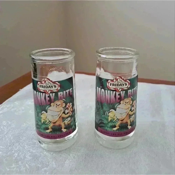 𝅺SHOT GLASS T G I FRIDAYS MONKEY BITE COLLECTABLE $10 Each - Picture 1 of 5